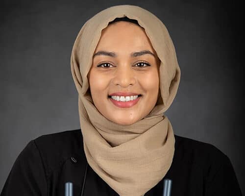 Headshot of Dr. Shammi Rouf, Holly Dental's dentist